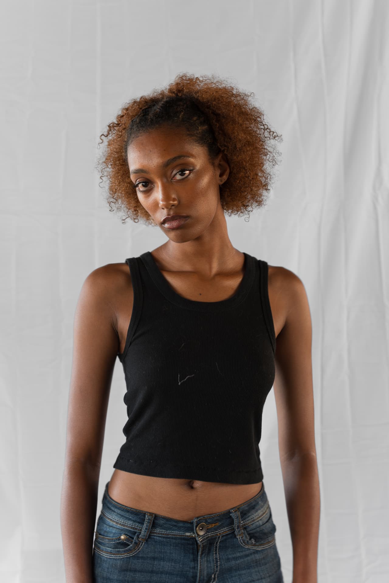 Studio portrait of a woman against a soft white backdrop